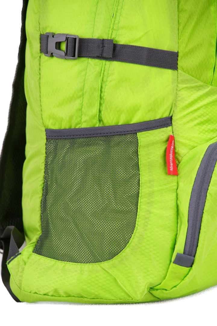 green folding backpack